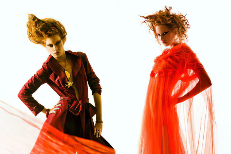 A man and a woman looking at the camera