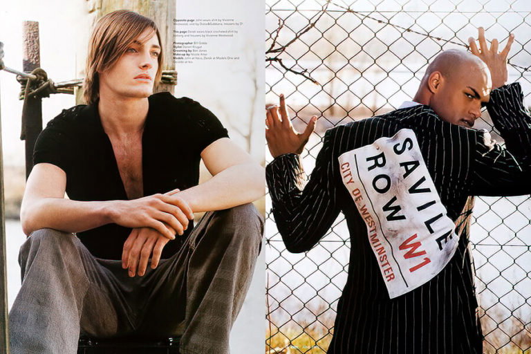 A man and a woman standing next to a fence