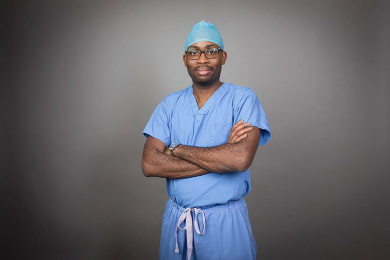 A man wearing a blue hat