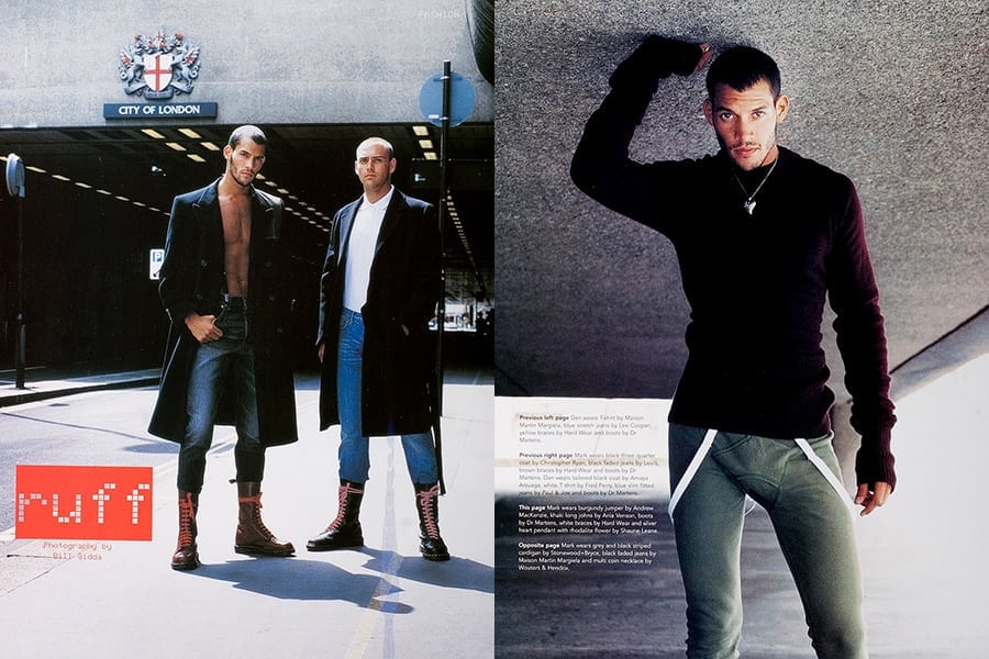 A group of people standing next to a person in a suit and tie