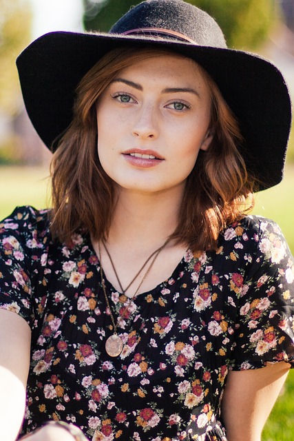 A close up of a person wearing a hat