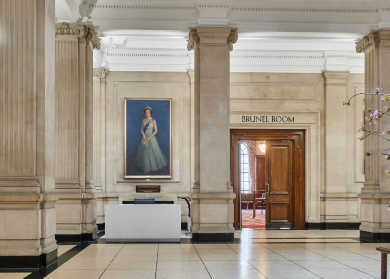 A kitchen with wooden cabinets