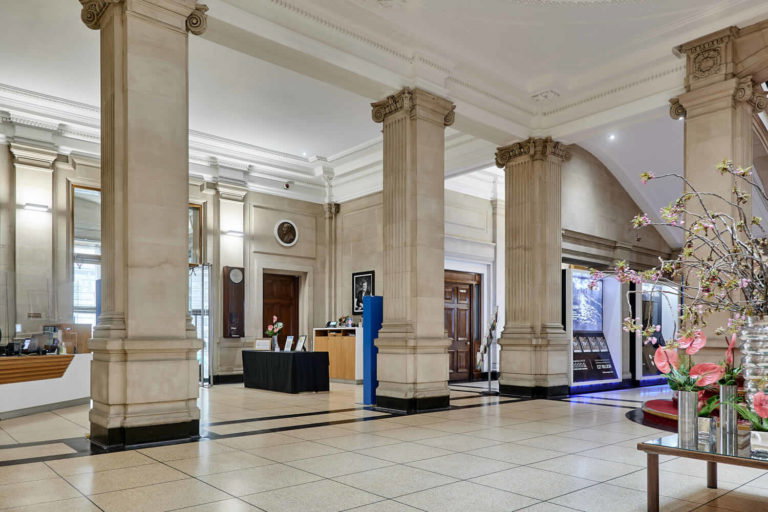 A room filled with furniture and a large window