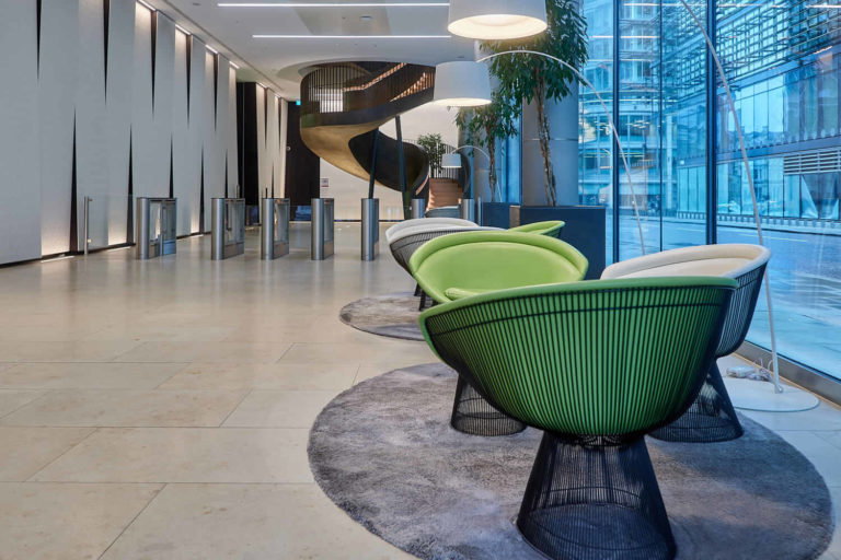 A chair sitting in front of a building