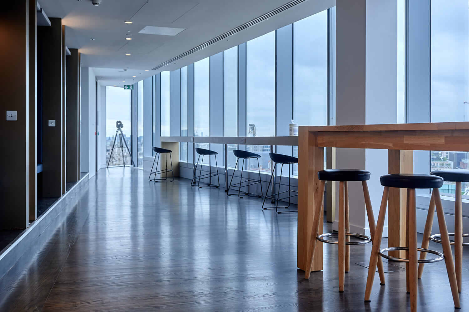 A dining room table in front of a window