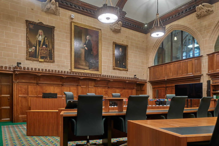 A living room filled with furniture and a large window