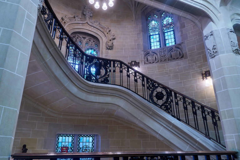 A person sitting at a train station