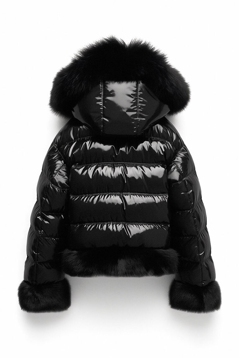 A person sitting next to a teddy bear