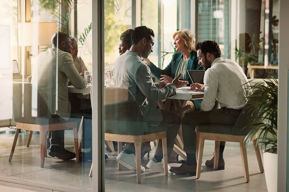 A group of people sitting at a table