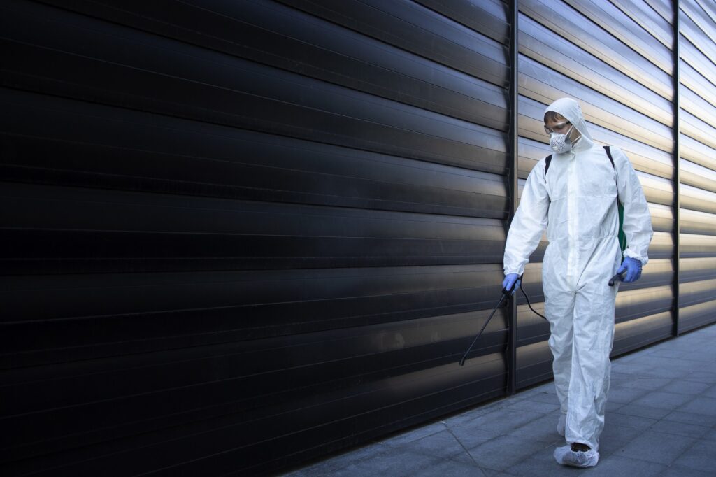 A person standing in front of a building