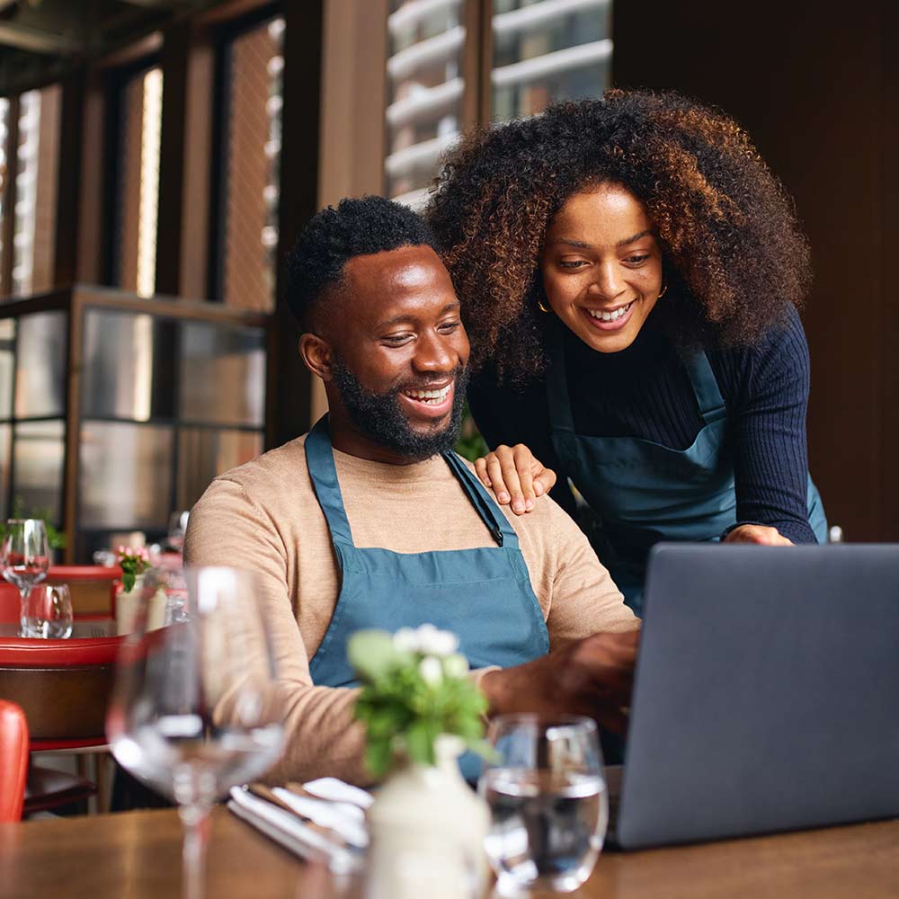 A man and a woman sitting at a table