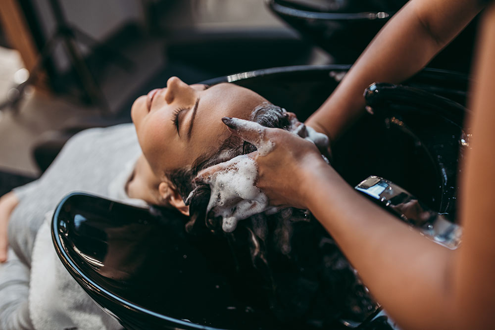 A woman sitting on a pan