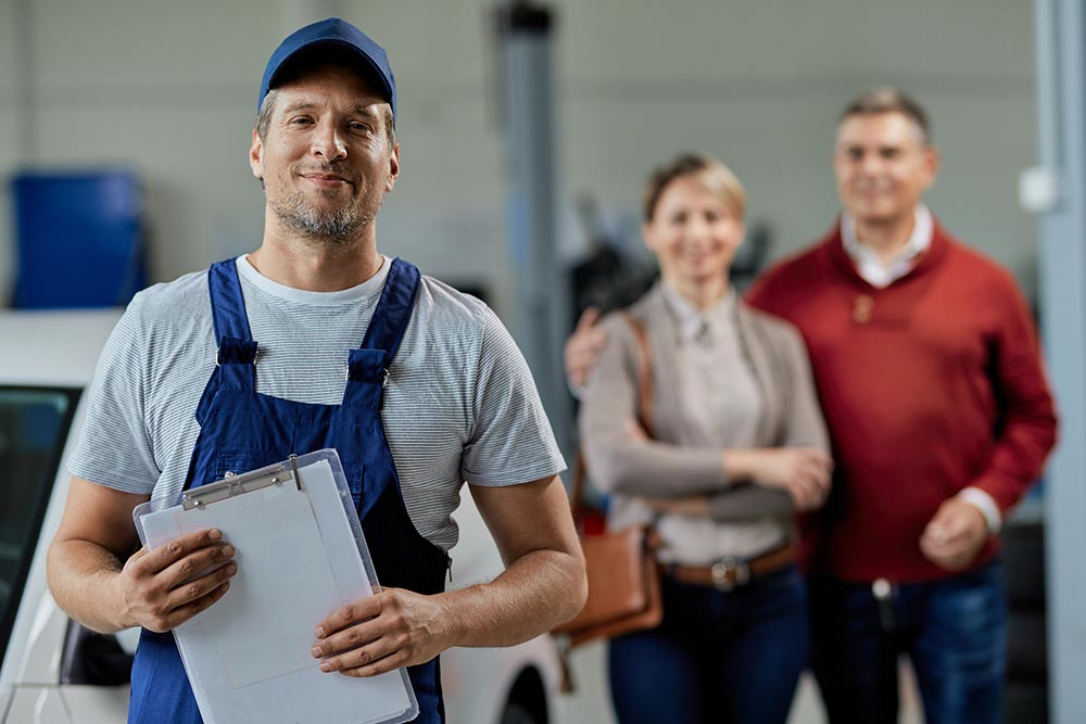 A man holding a laptop