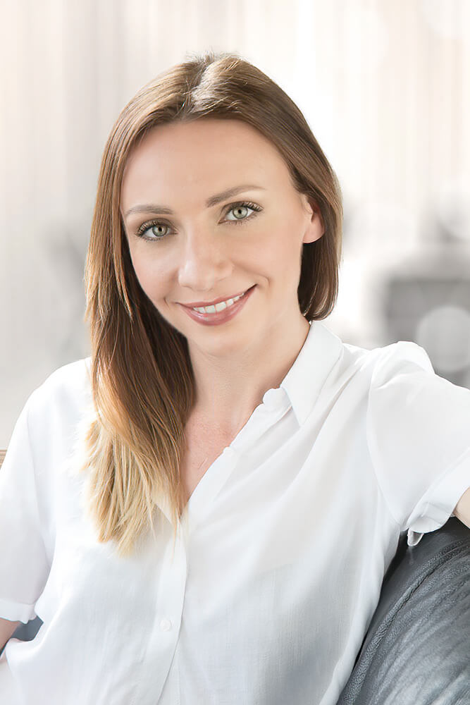 A woman wearing a white shirt