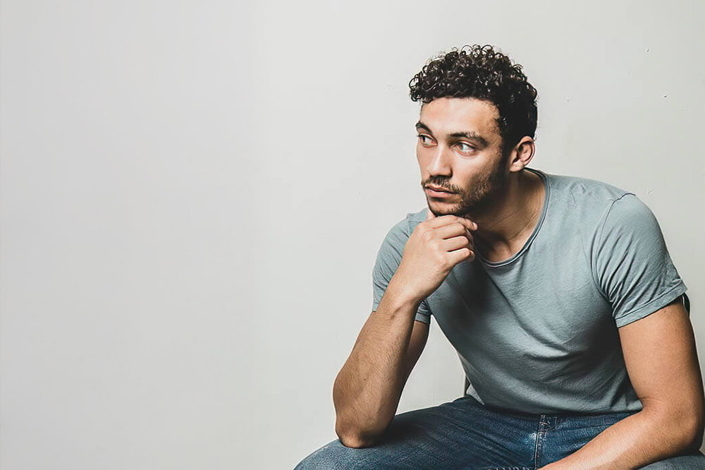 A man in a blue shirt