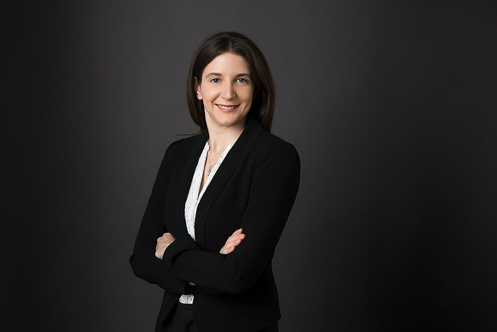 A person wearing a suit and tie