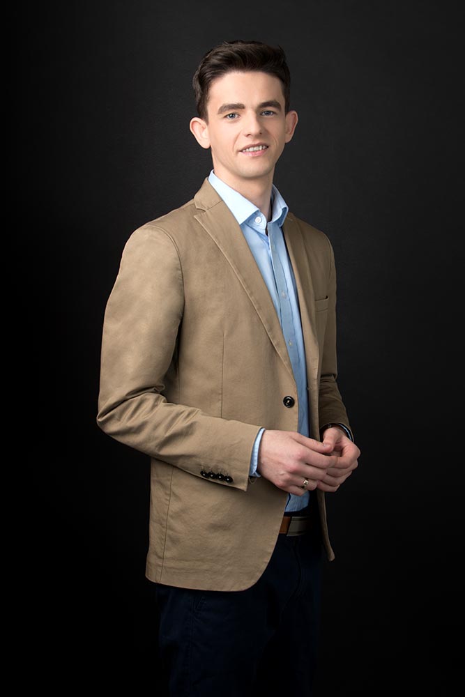 A man wearing a suit and tie