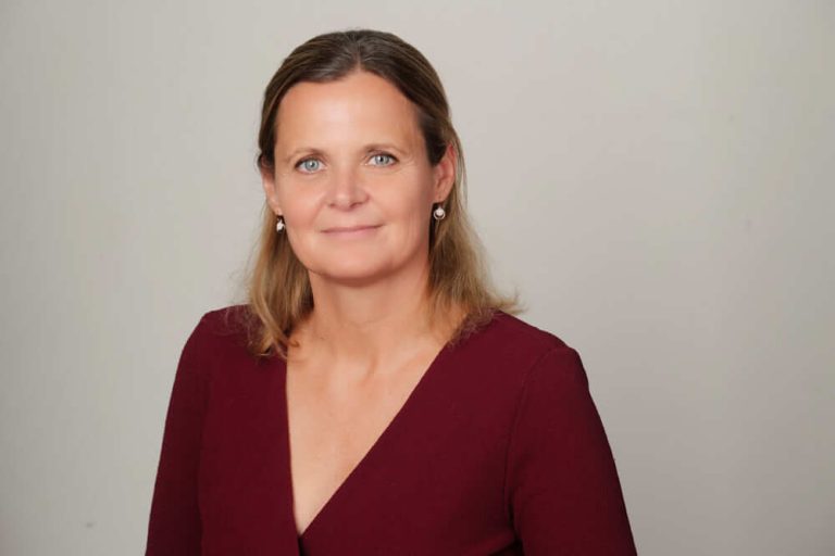 A person smiling for the camera