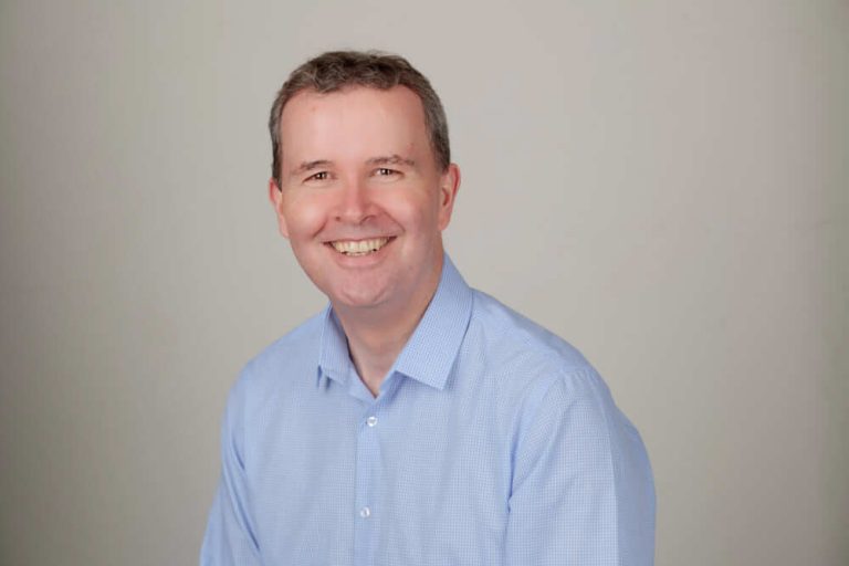 A man smiling for the camera