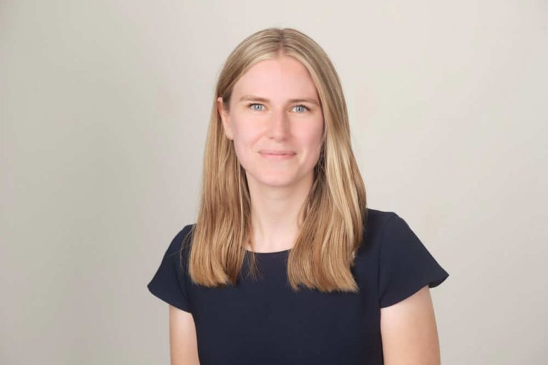 A woman smiling for the camera