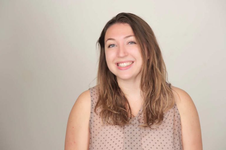 A woman smiling for the camera