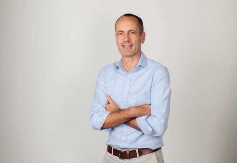 A person standing posing for the camera