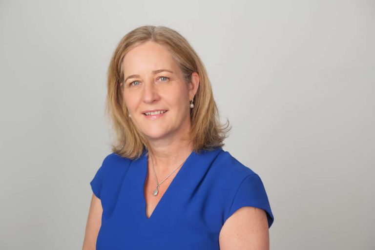 A woman wearing a blue shirt