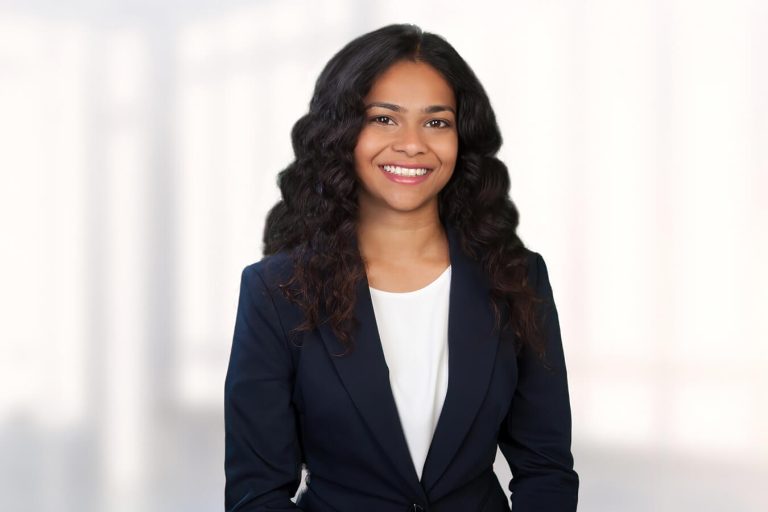 Carly Houston wearing a suit and tie