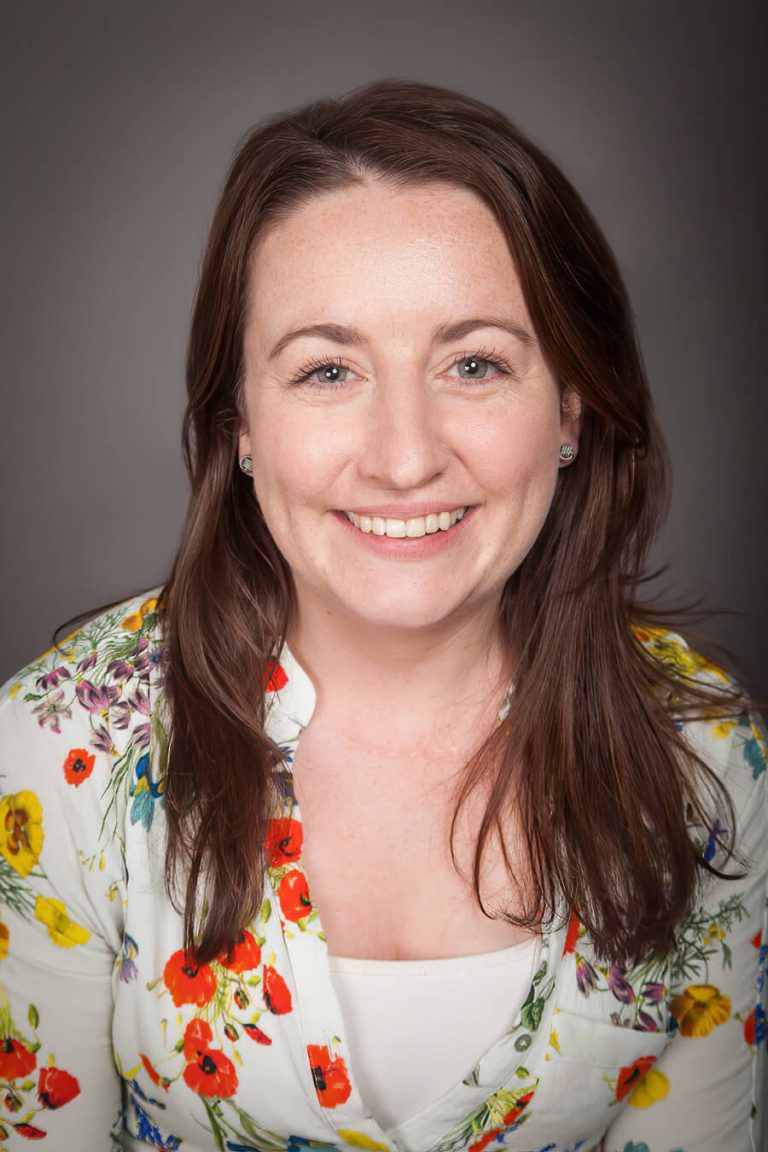 A woman smiling for the camera