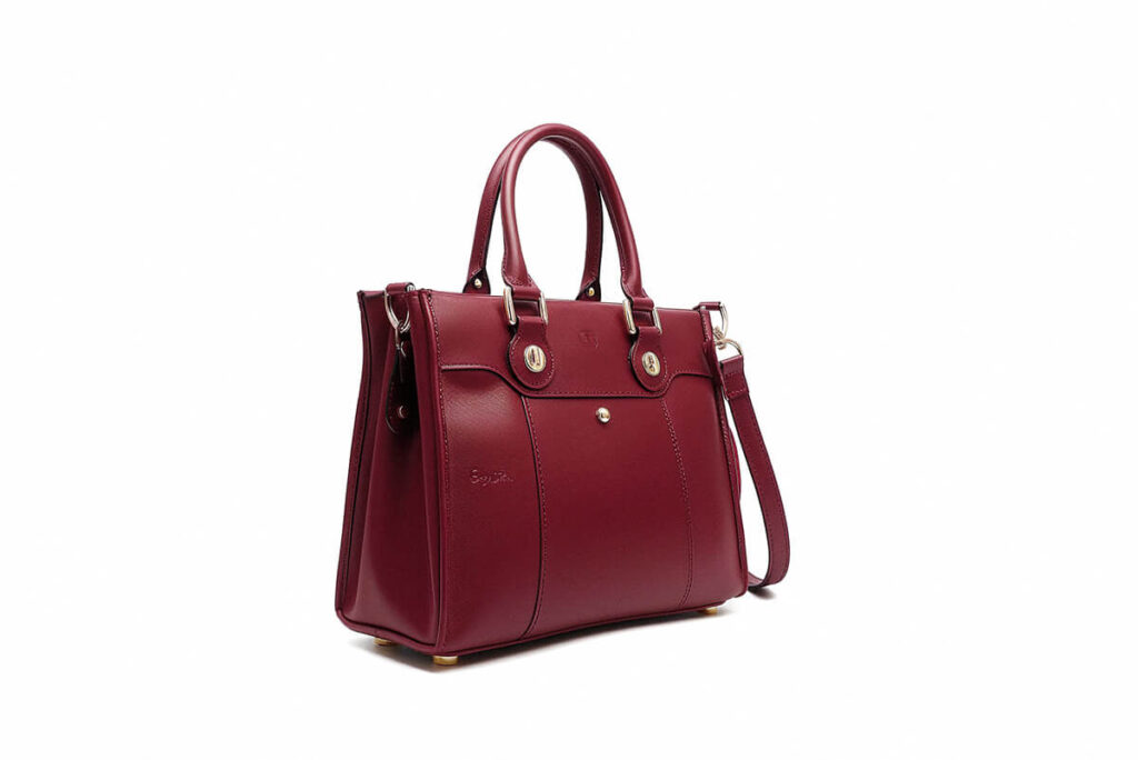 A bag of luggage sitting on top of a suitcase