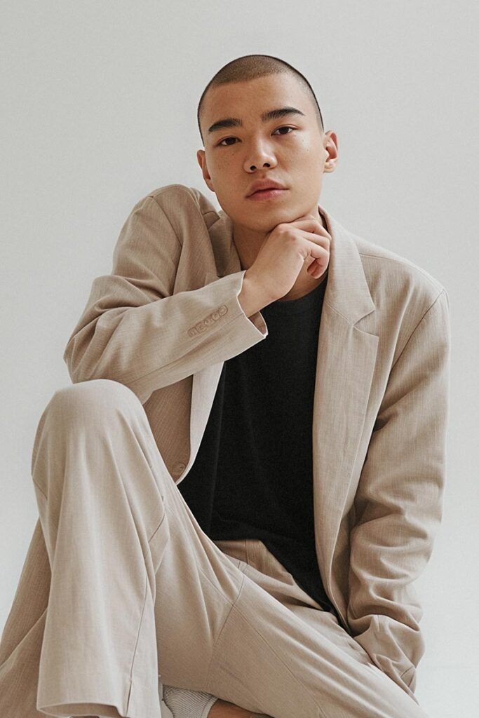 A person wearing a suit and tie